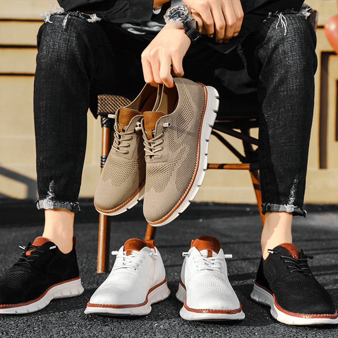 Elegante en ademende herenschoenen op een witte achtergrond, perfect voor veelzijdige gelegenheden en stijlvol comfort.