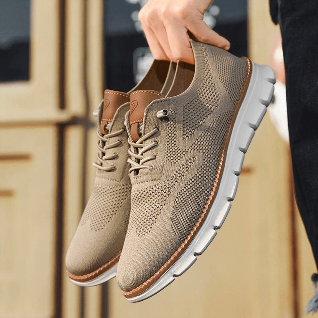 Elegante en ademende herenschoenen op een witte achtergrond, perfect voor veelzijdige gelegenheden en stijlvol comfort.