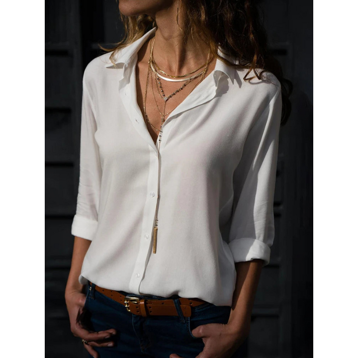 Elegante, witte damesblouse met lange mouwen en veelzijdige knoopsluiting, getailleerd, ideaal voor kantoor en avond