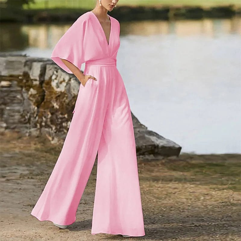 Elegant damesjumpsuit met V-hals, dolmanmouwen, elastische tailleband en wijde pijpen in zwart en bordeauxrood.