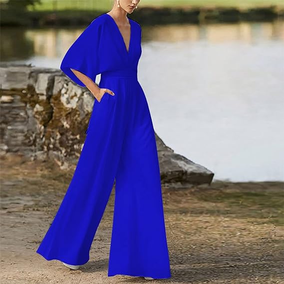 Elegant damesjumpsuit met V-hals, dolmanmouwen, elastische tailleband en wijde pijpen in zwart en bordeauxrood.