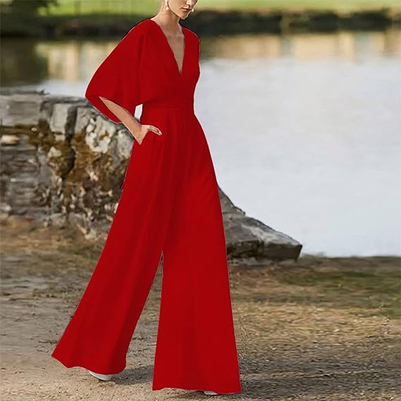 Elegant damesjumpsuit met V-hals, dolmanmouwen, elastische tailleband en wijde pijpen in zwart en bordeauxrood.