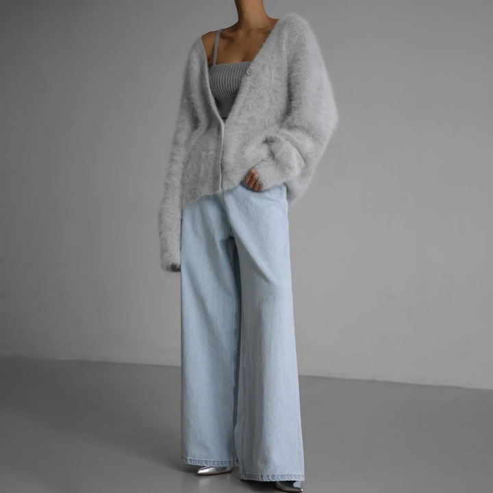 Elegant kasjmier vest in oversized design met V-hals en knopen, comfortabel voor alle gelegenheden.