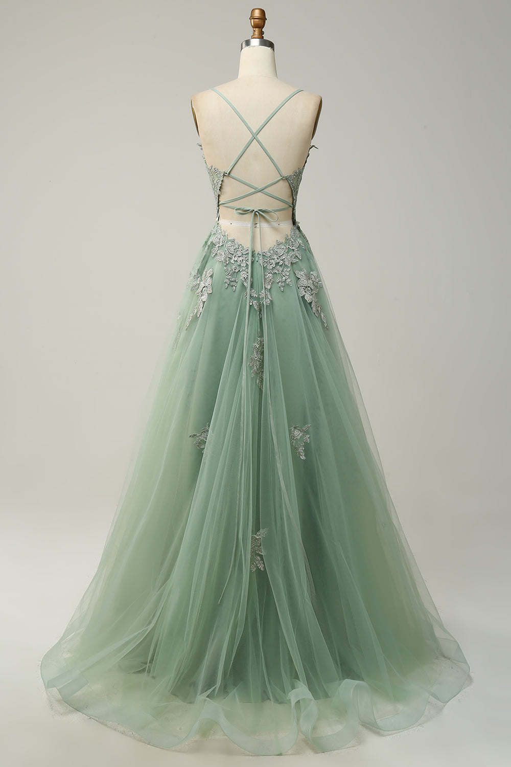 Elegante A-lijn galajurk met spaghettibandjes in donkergroen, perfecte keuze voor feestelijke gelegenheden en bruiloften.