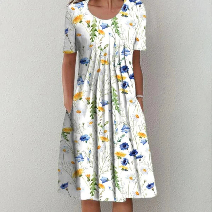 Elegante katoenen jurk met een verfijnde pasvorm en stijlvolle details, perfect voor formele en casual gelegenheden.
