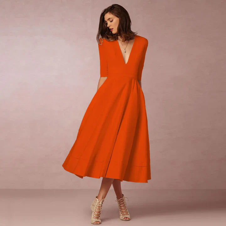 Elegante dames midi-avondjurk, klassiek silhouet, luxueuze stof, perfect voor formele gelegenheden.