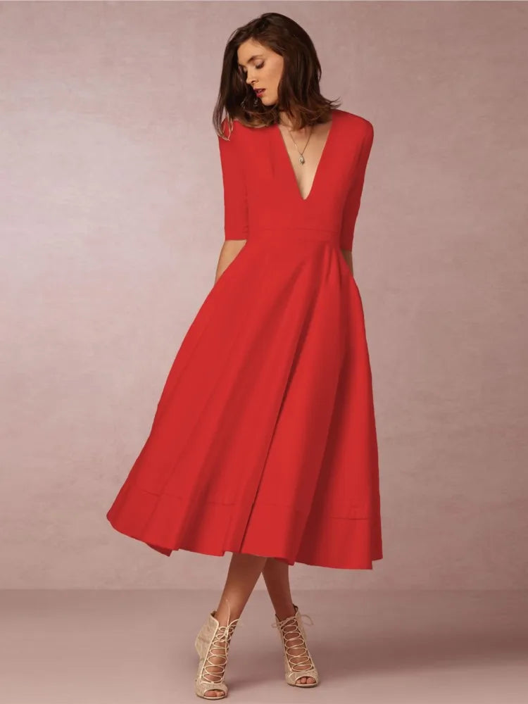 Elegante dames midi-avondjurk, klassiek silhouet, luxueuze stof, perfect voor formele gelegenheden.