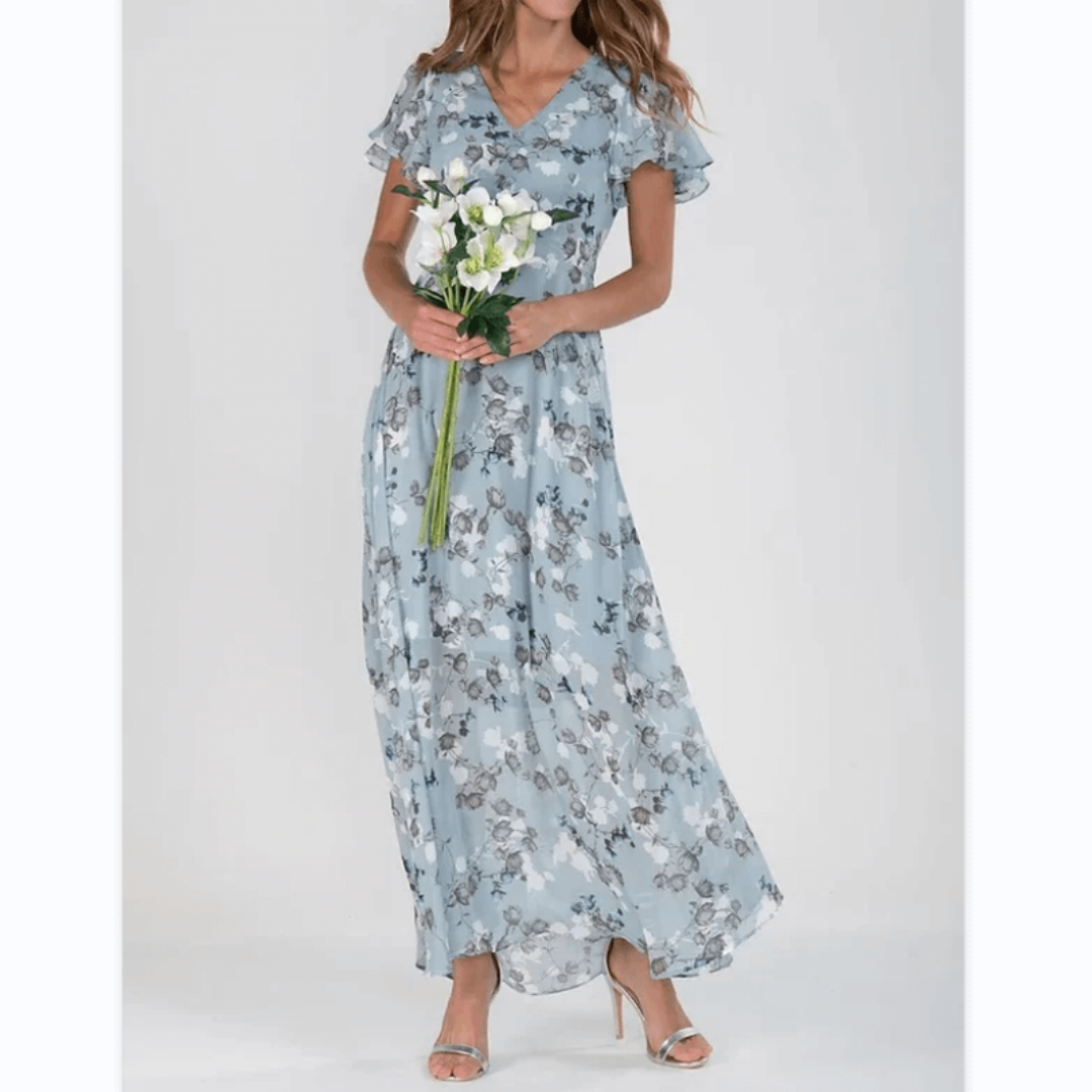 Elegant bloemen maxijurk voor dames, vloeiend met romantische patronen; ideaal voor bruiloftsgasten en zomerse evenementen.