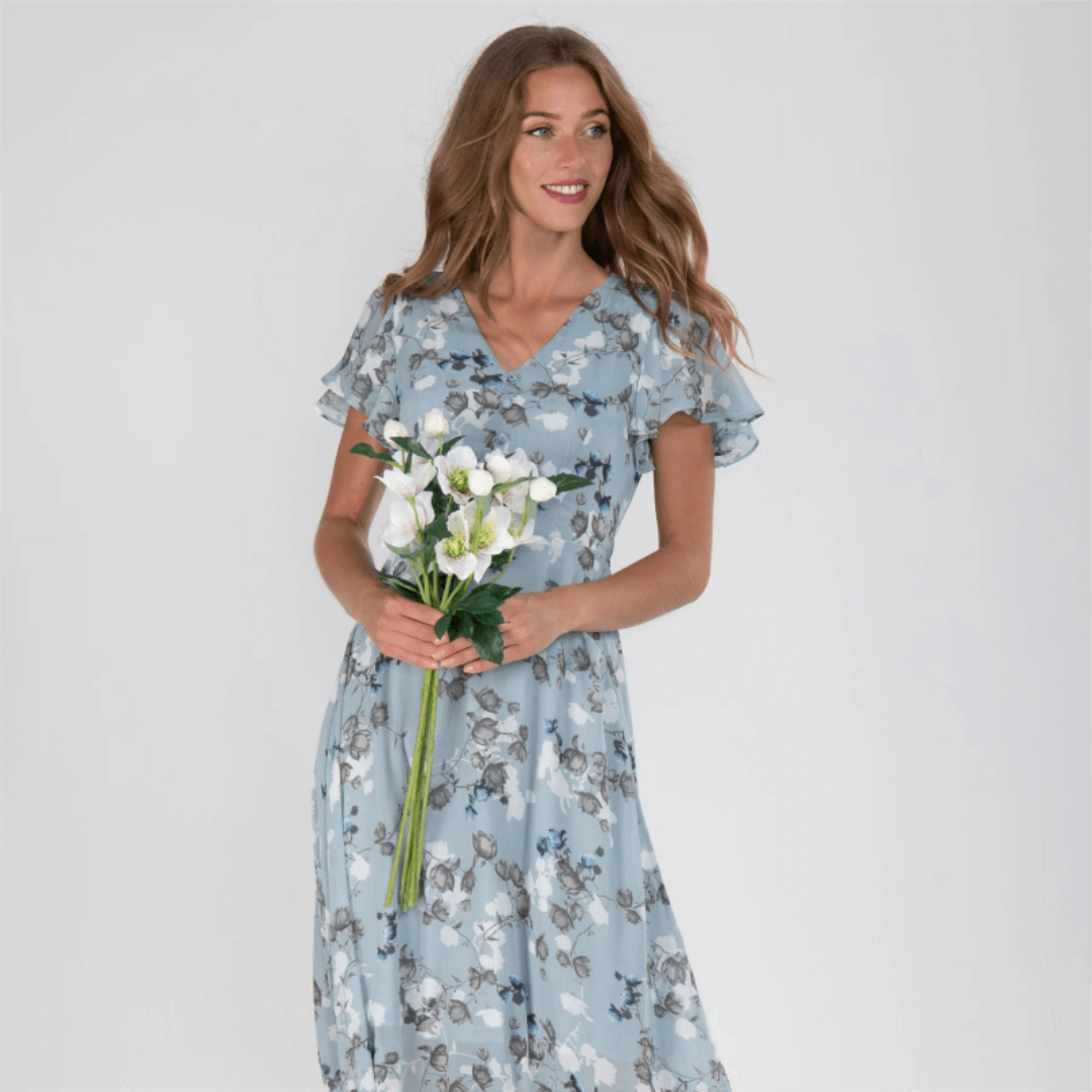 Elegant bloemen maxijurk voor dames, vloeiend met romantische patronen; ideaal voor bruiloftsgasten en zomerse evenementen.