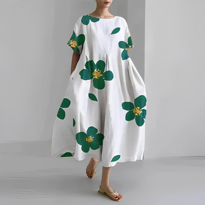 Elegante dames bloemenjurk met bloemenpatronen, perfecte keuze voor de zomer, combineert comfort met een stijlvolle pasvorm.