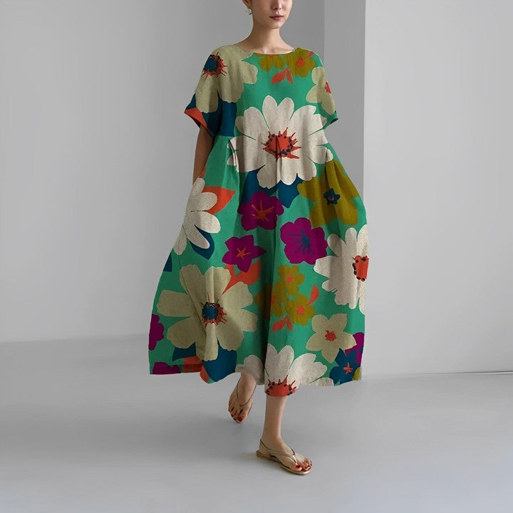 Elegante dames bloemenjurk met bloemenpatronen, perfecte keuze voor de zomer, combineert comfort met een stijlvolle pasvorm.