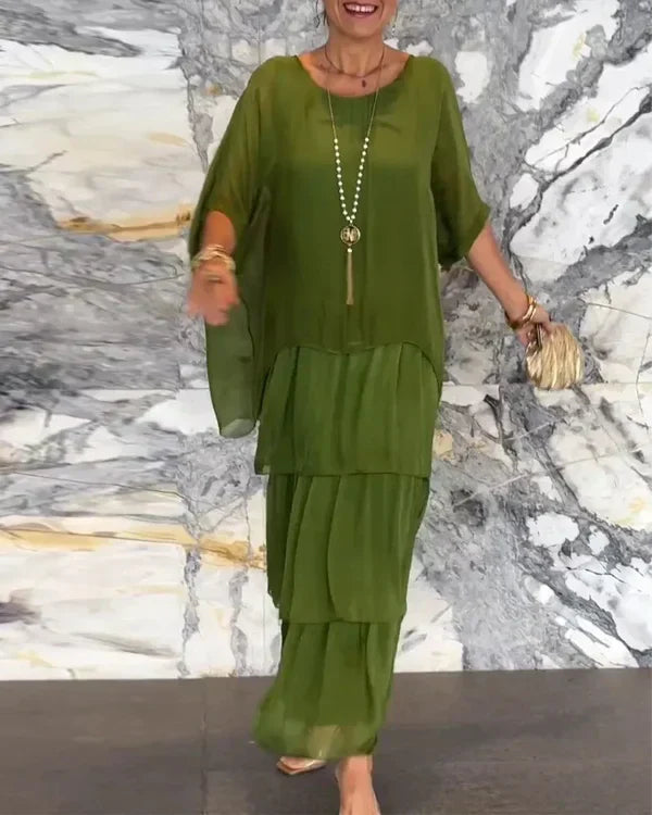 Elegant dames chiffon jurk met laagjeslook, vloeiend en figuurvleiend, ideaal voor feestelijke en formele gelegenheden.