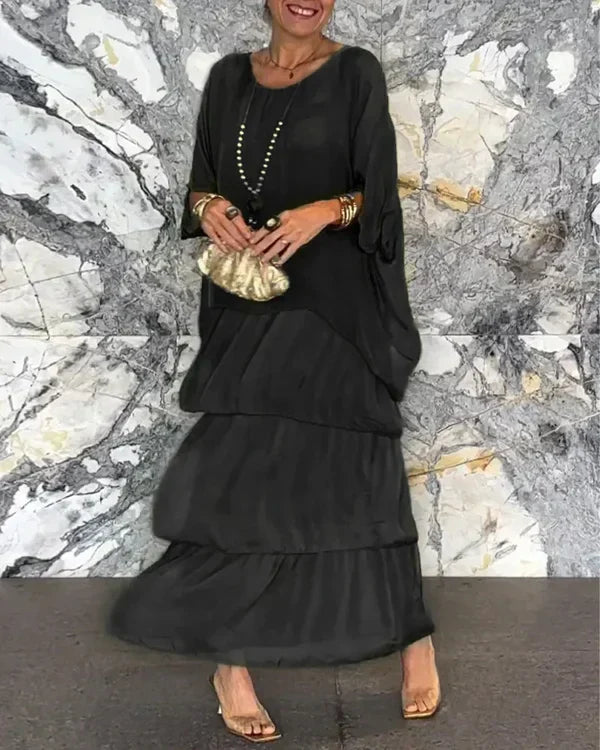 Elegant dames chiffon jurk met laagjeslook, vloeiend en figuurvleiend, ideaal voor feestelijke en formele gelegenheden.