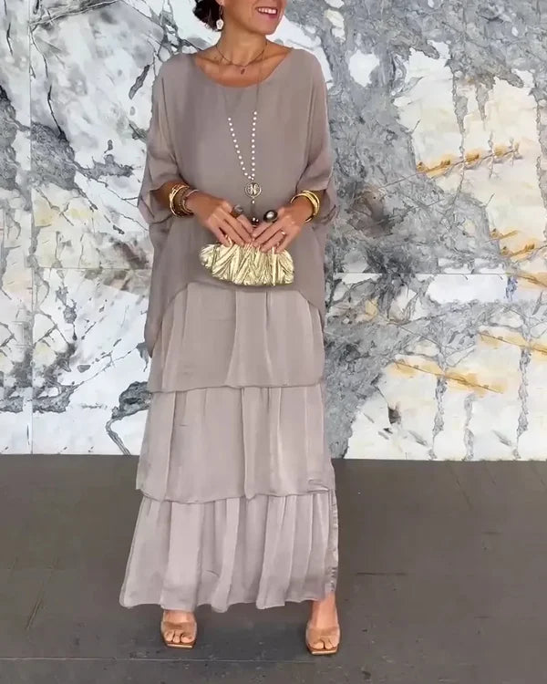 Elegant dames chiffon jurk met laagjeslook, vloeiend en figuurvleiend, ideaal voor feestelijke en formele gelegenheden.