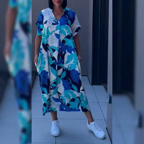 Elegante dames maxijurk met kunstprint, vloeiende silhouet, ideaal voor diverse gelegenheden, comfortabel en stijlvol.