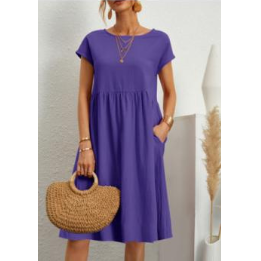 Elegant zomerjurkje voor dames met empire-silhouet, korte mouwen en een luchtige rok, ideaal voor warme dagen en veelzijdig in stijl.