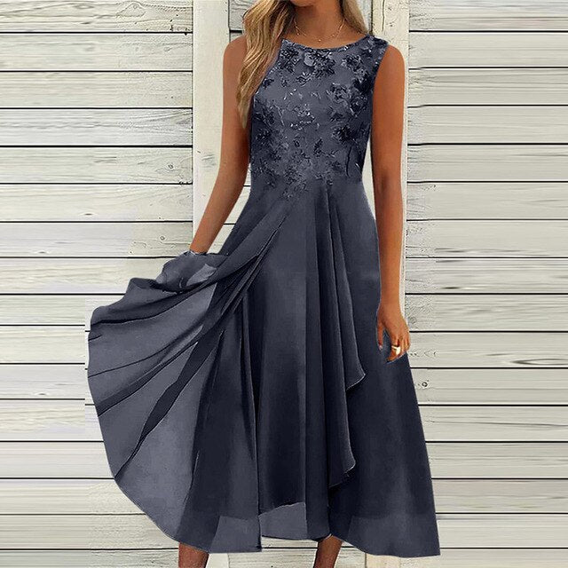 Dames kleding: elegante zomerjurk die zelfvertrouwen uitstraalt.