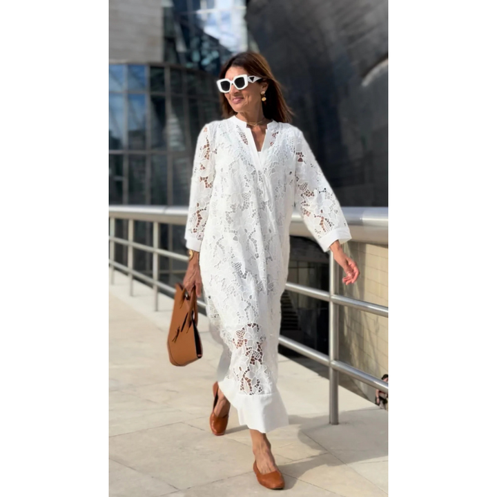 Elegante kanten jurk voor dames met 3/4 mouwen, A-lijn model, verfijnde kanten patronen, ideaal voor bruiloften en formele evenementen.