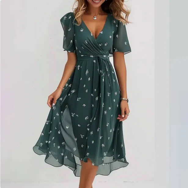 Elegante dames V-hals jurk, figuurlijk silhouet, veelzijdig voor elke gelegenheid en gemaakt van ademend materiaal.