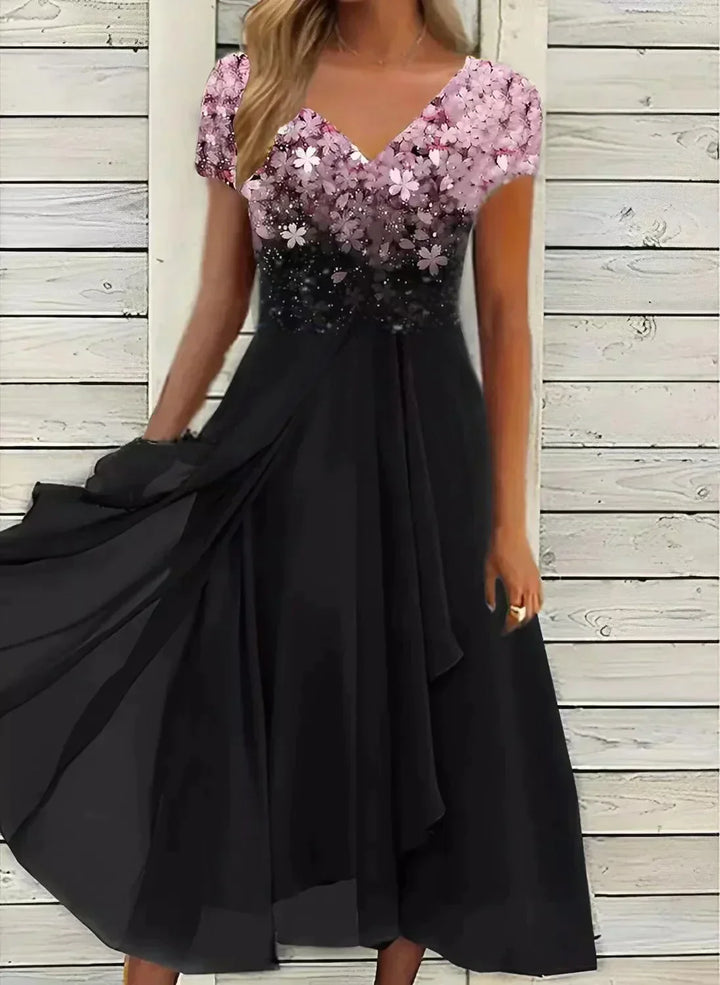 Elegant dames midi-jurk met bloemenprint, sierlijk ontwerp, flatterende pasvorm, ideaal voor speciale gelegenheden.