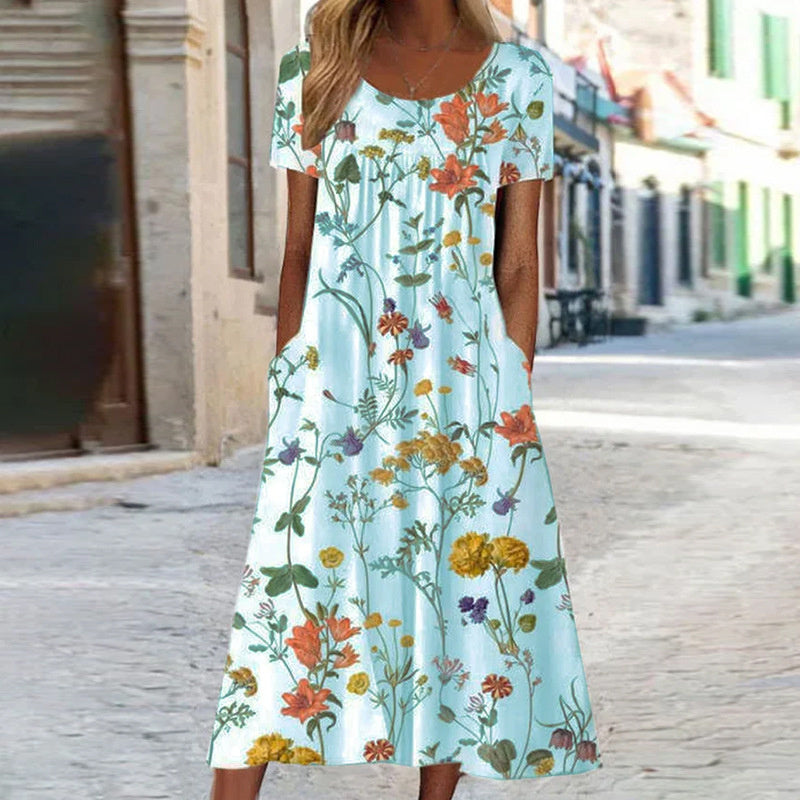 Elegante damesjurk met levendig bloemenpatroon en een flatterende snit, ideaal voor zowel formele als casual gelegenheden.