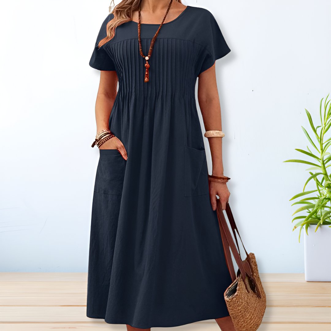 Elegant Emilia jurkje met vloeiende, figuurvleiende snit, perfect voor dagelijks gebruik of op kantoor, verkrijgbaar in de damesmodecollectie.