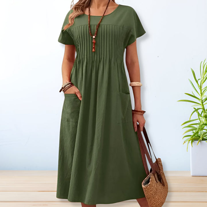 Elegant Emilia jurkje met vloeiende, figuurvleiende snit, perfect voor dagelijks gebruik of op kantoor, verkrijgbaar in de damesmodecollectie.