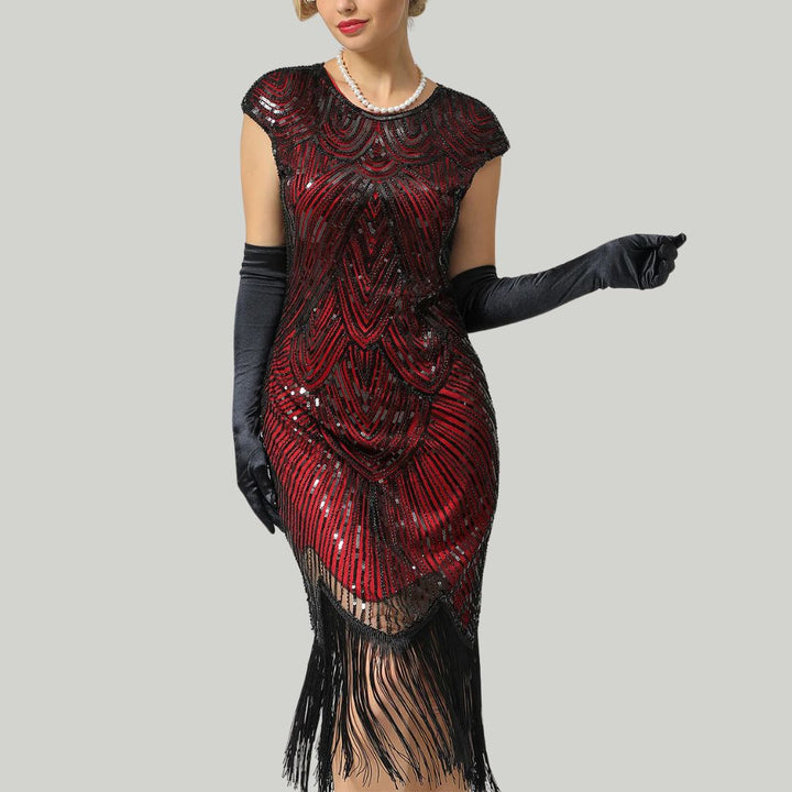 Elegante glitterjurk in Gatsby-stijl met sprankelende pailletten en franjes, nauwsluitend, in bordeauxrood, goud en andere kleuren.