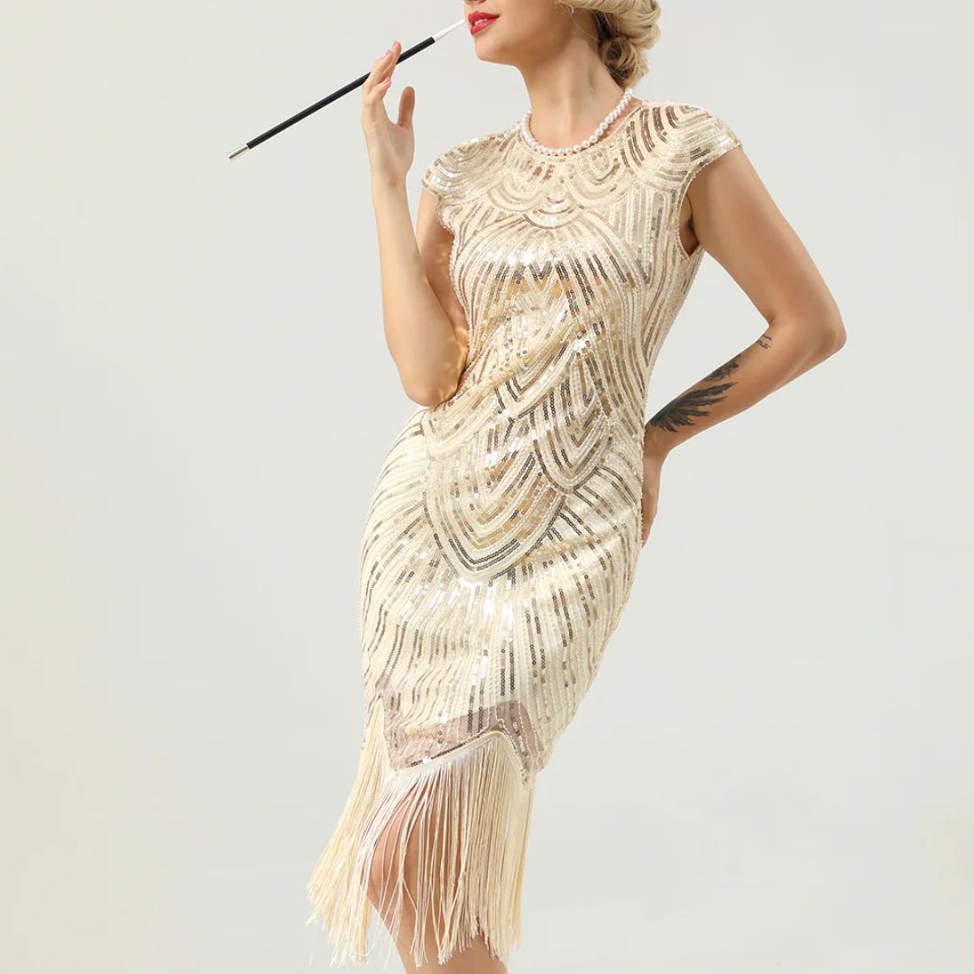 Elegante glitterjurk in Gatsby-stijl met sprankelende pailletten en franjes, nauwsluitend, in bordeauxrood, goud en andere kleuren.