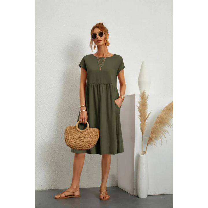 Elegante kortmouwige zomerjurk voor dames in midi-lengte, accentueert het figuur, ideaal voor formele en casual gelegenheden.
