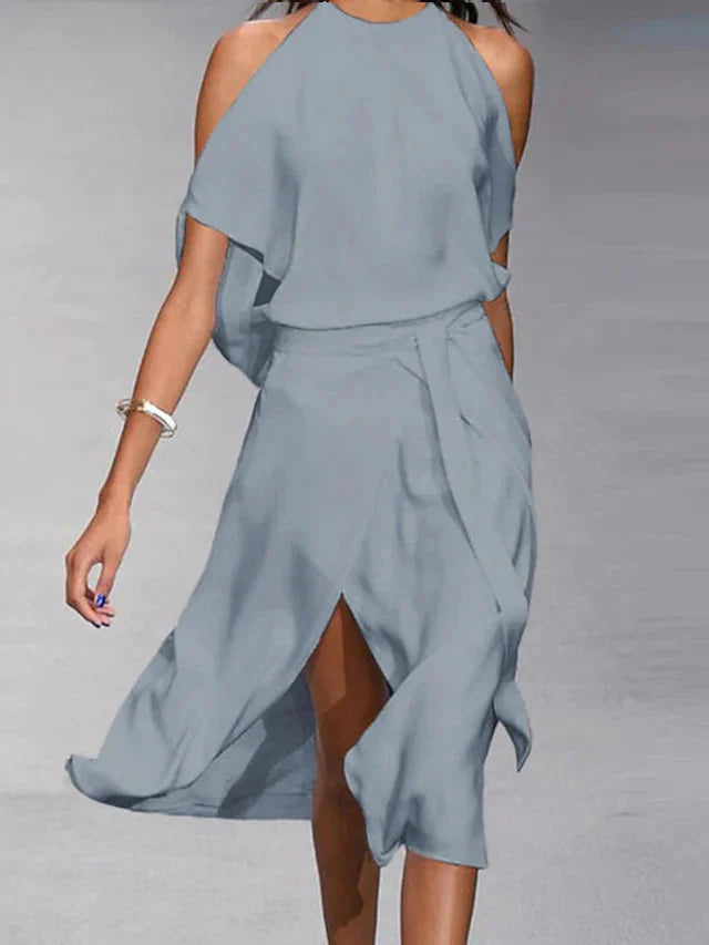 Elegant Madonna halter midi jurk, blote schouders, vloeiende pasvorm, asymmetrische zoom, perfect voor speciale gelegenheden.