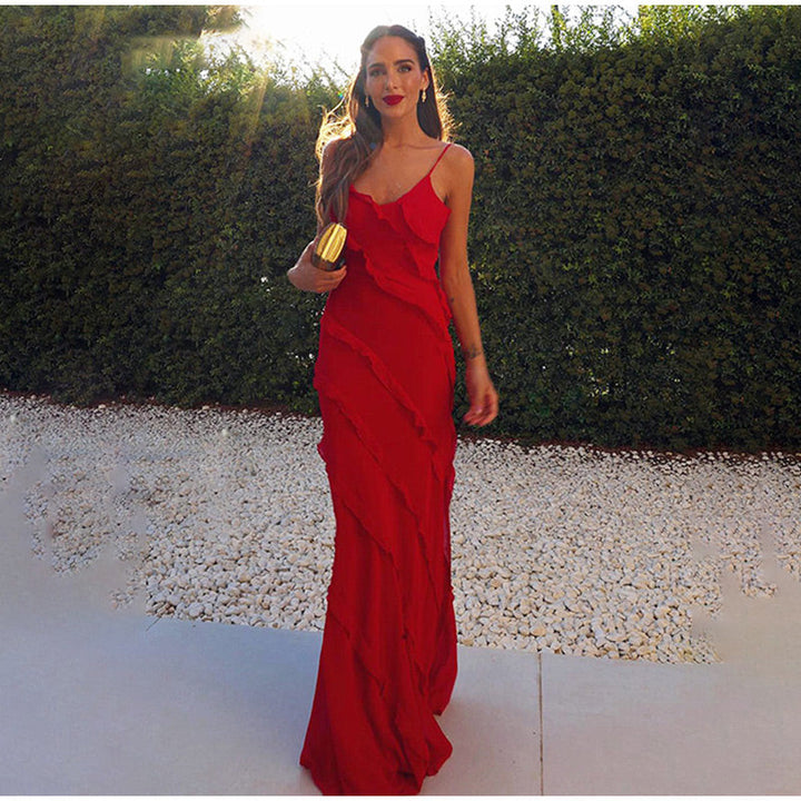 Elegante maxi-jurk met ruches, ideaal voor zomerse gelegenheden; zijaanzicht toont romantische details en soepel ontwerp.