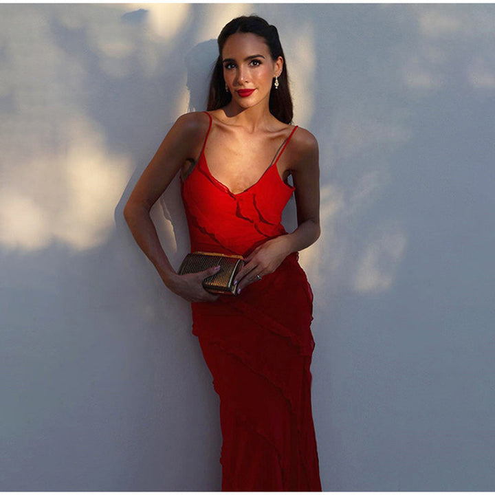 Elegante maxi-jurk met ruches, ideaal voor zomerse gelegenheden; vooraanzicht toont romantische details en soepel ontwerp.