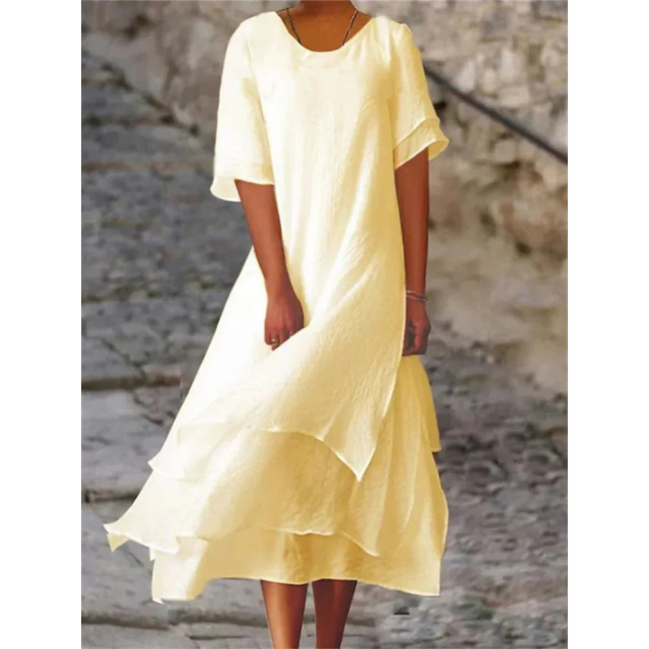 Elegante midi damesjurk in een flatterende kleur en perfecte pasvorm voor dagelijks comfort.