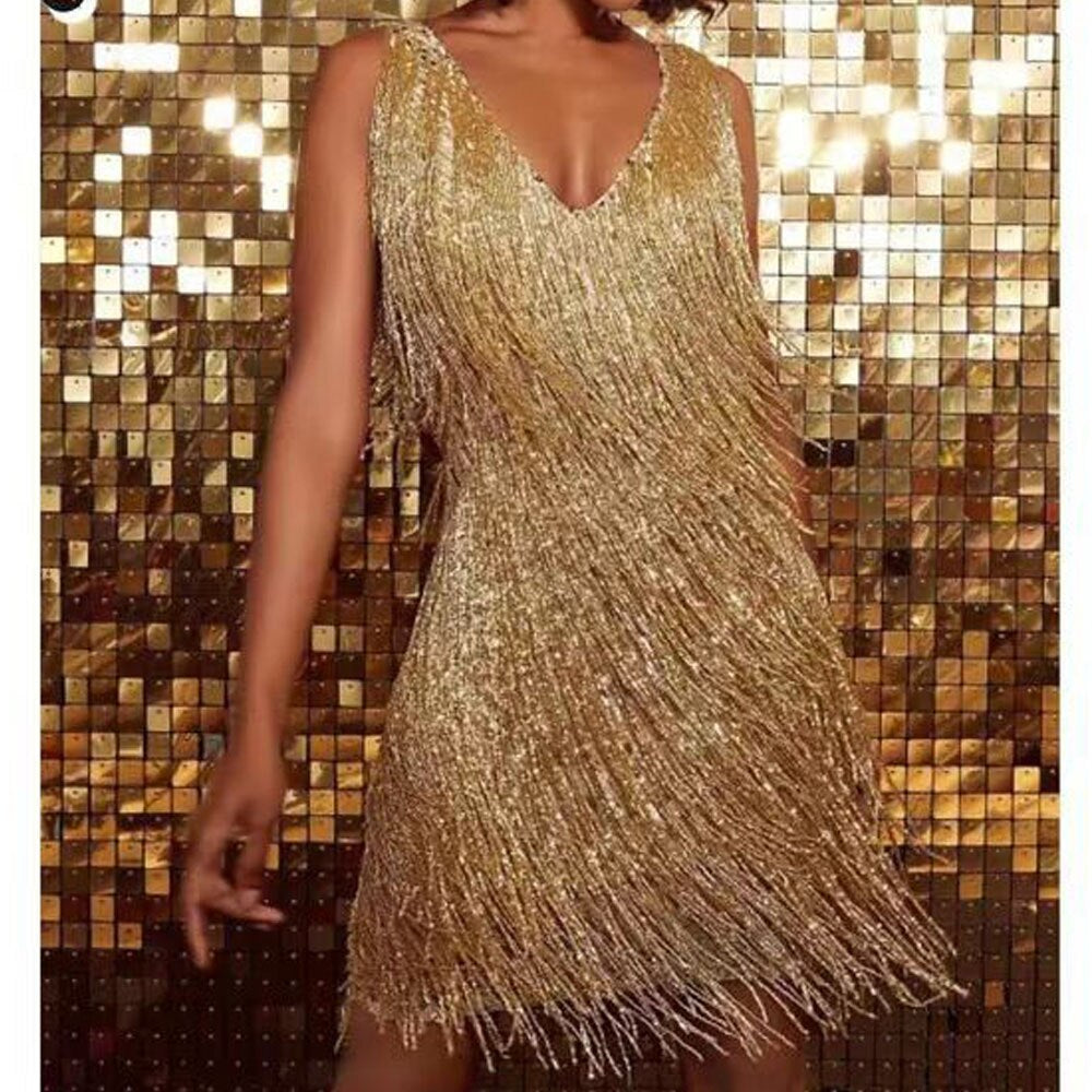 Elegante mini partyjurk voor dames met sprankelende pailletten en franjes, nauwsluitende pasvorm, perfect voor glamoureuze gelegenheden.