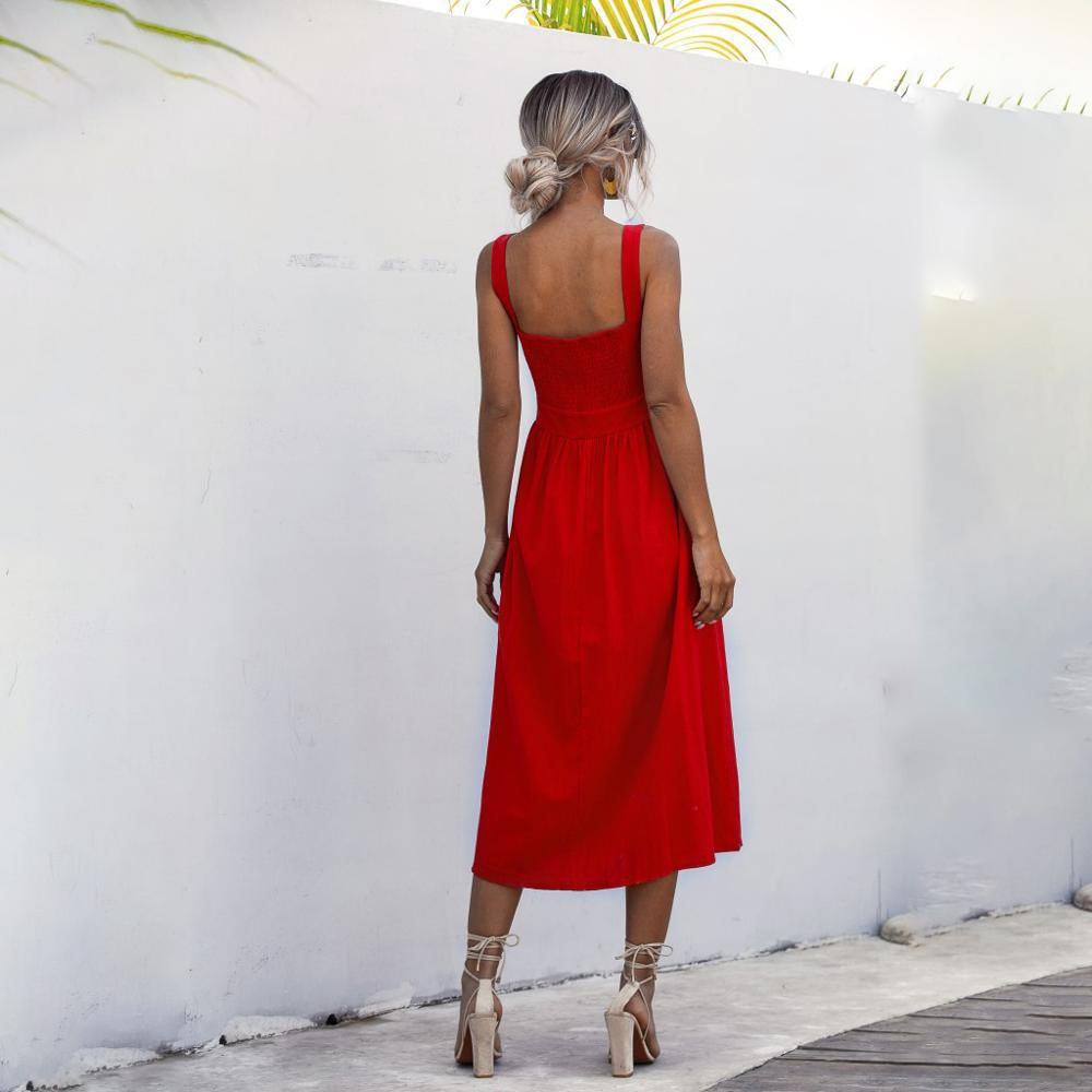 Elegant rood dames zomerjurk met losse pasvorm, luchtige stof en tijdloos design, ideaal voor warme dagen.