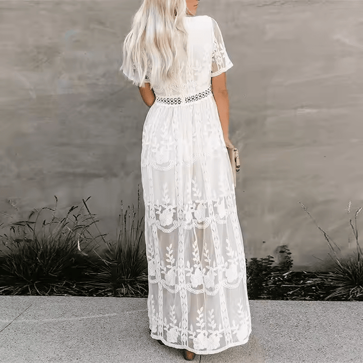 Winifredim Witte Maxi-jurk Dames achteraanzicht, een vloeiend silhouet dat ideaal is voor diverse gelegenheden.