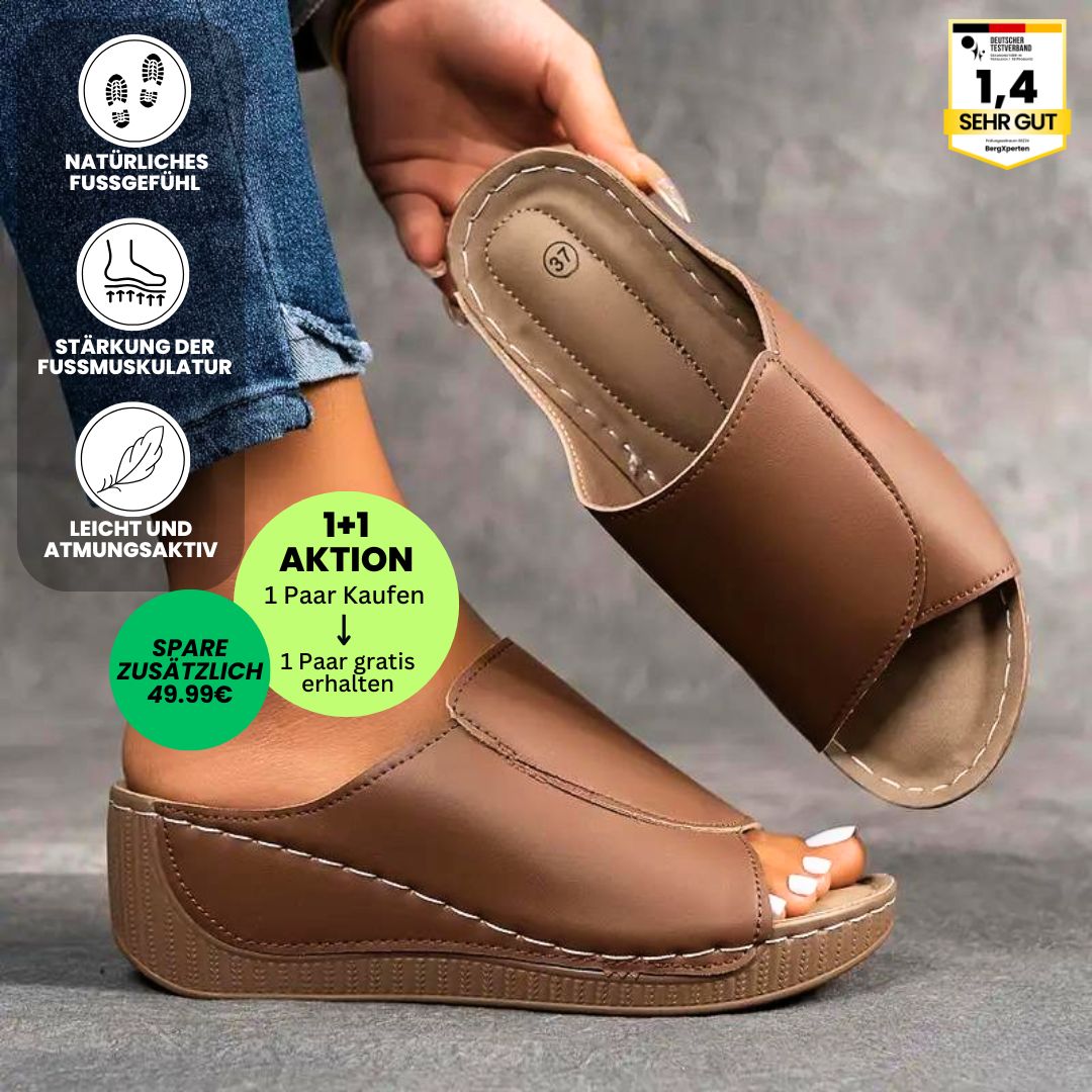 Ergonomische, antislip dames badslippers in het wit, ideaal voor comfort en stabiliteit.