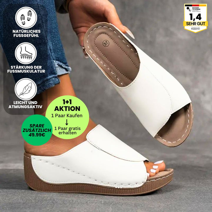 Ergonomische, antislip dames badslippers in het wit, ideaal voor comfort en stabiliteit.