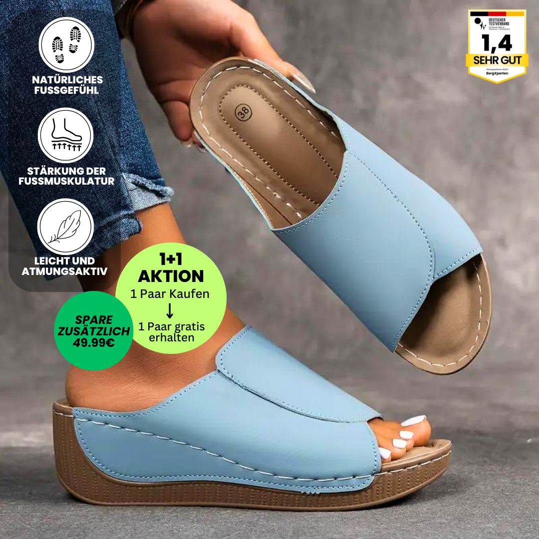 Ergonomische, antislip dames badslippers in het wit, ideaal voor comfort en stabiliteit.