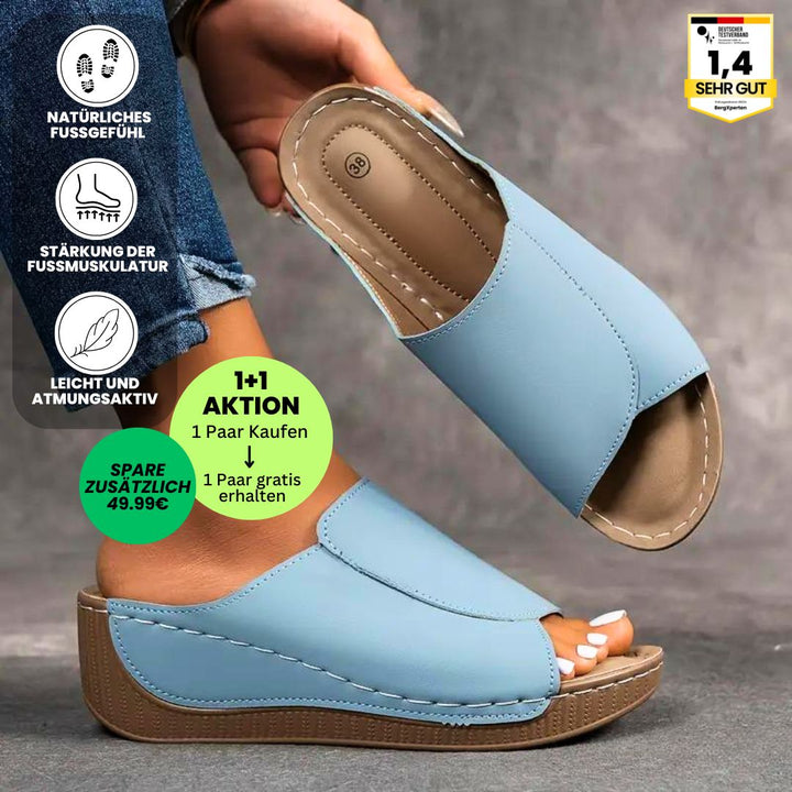 Ergonomische, antislip dames badslippers in het wit, ideaal voor comfort en stabiliteit.