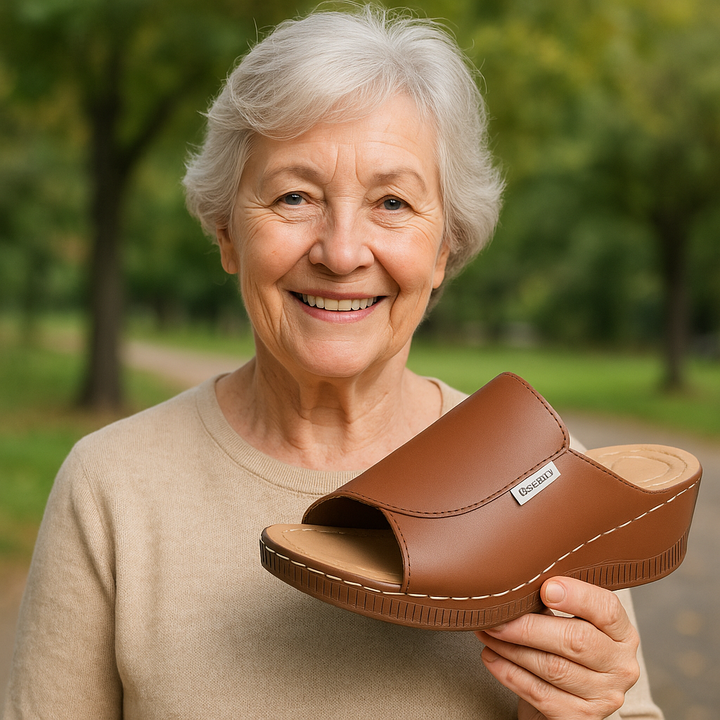 Ergonomische, antislip dames badslippers in het wit, ideaal voor comfort en stabiliteit.
