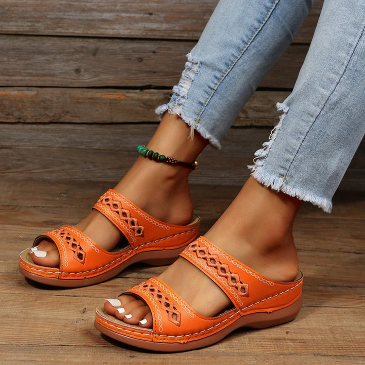 Dames sandalen met orthopedische ondersteuning, zwart design, ideaal voor lange dagen.