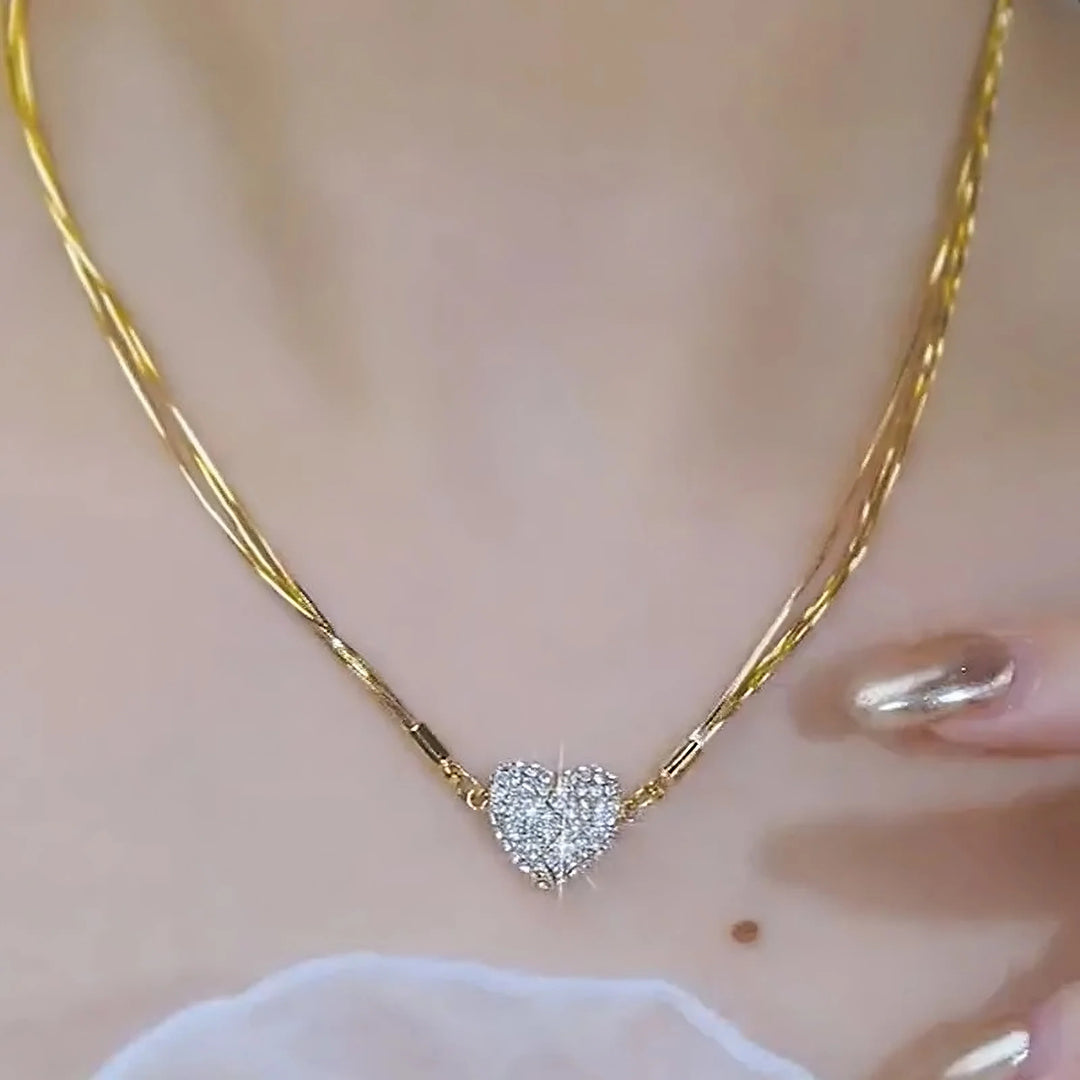 Glanzende EternaBand damesketting in zilver/goud finish. Ideaal cadeau, nu 1+1 gratis. Elegant sieraad voor haar.