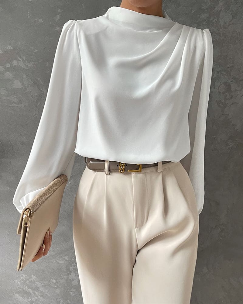 Elegante witte ruchesblouse met opstaande kraag