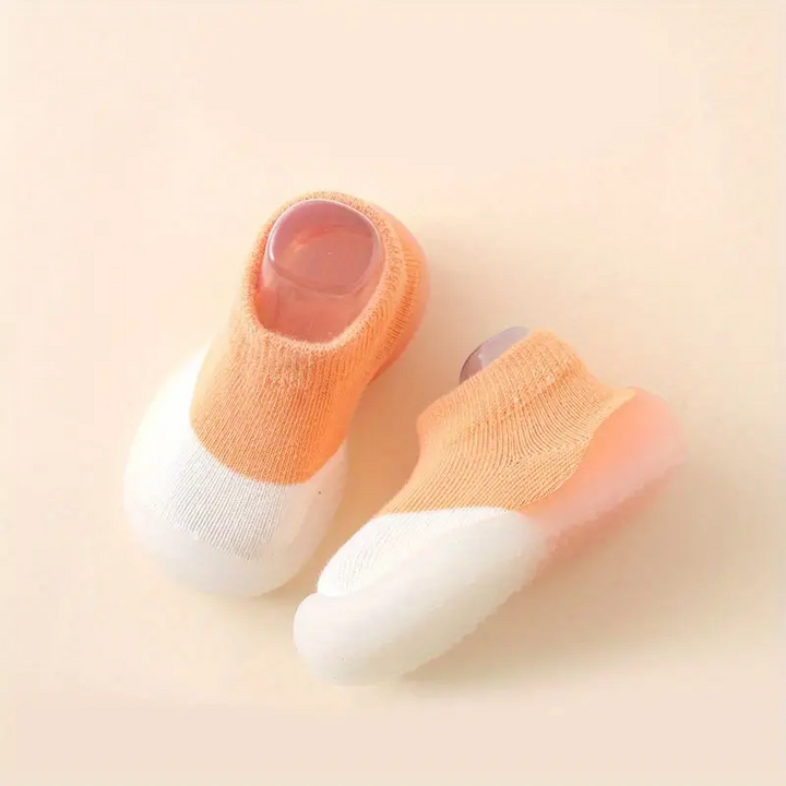 Makkelijke klittenbandsluiting op barefoot loopschoenen, voor snelle aan- en uittrekcomfort.