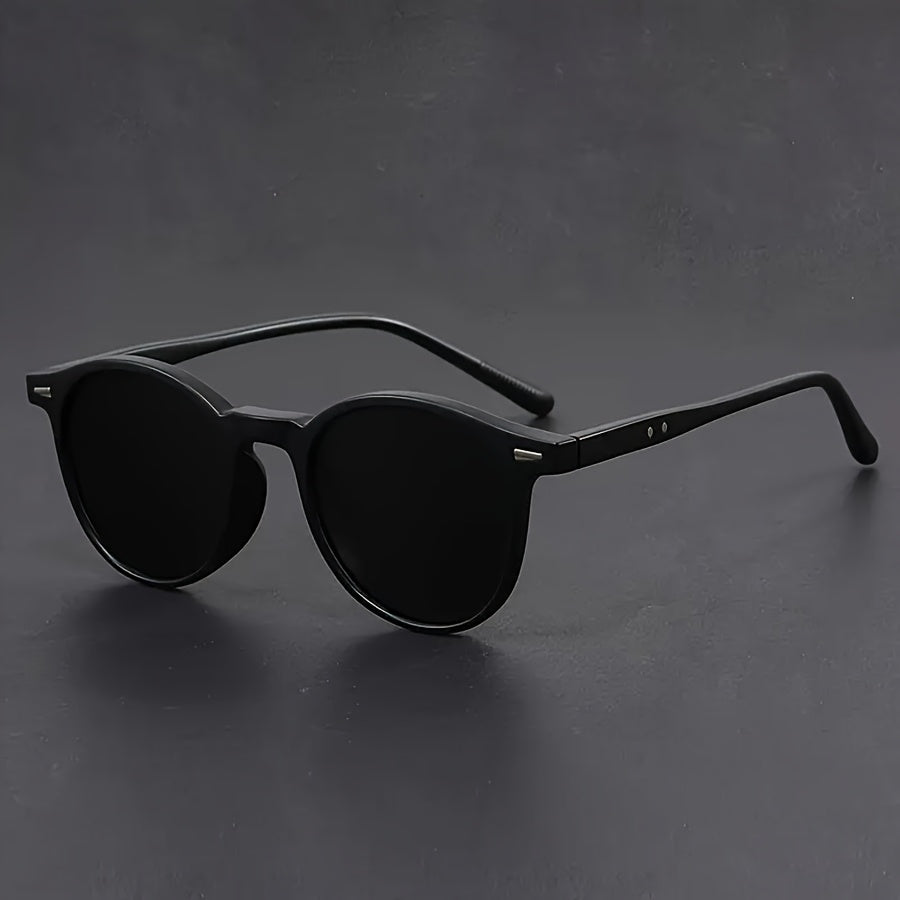 Stijlvolle heren zonnebril, rond model met vintage esthetiek. Een modieus accessoire.
