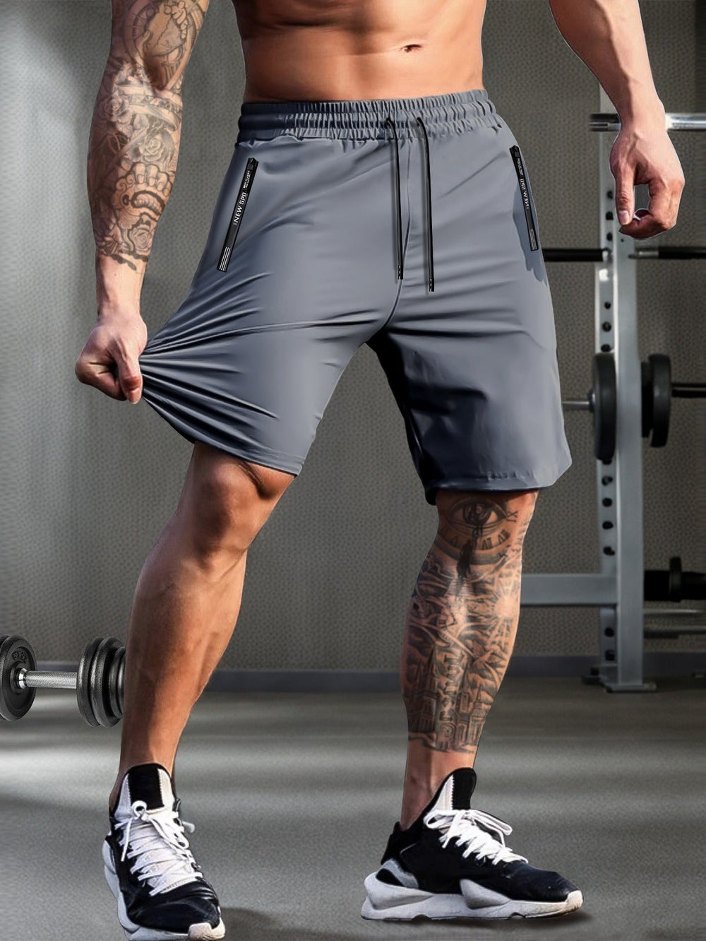 Grijze heren short met trekkoord en ritszakken, ideaal voor training en zomerse activiteiten, sportieve look.