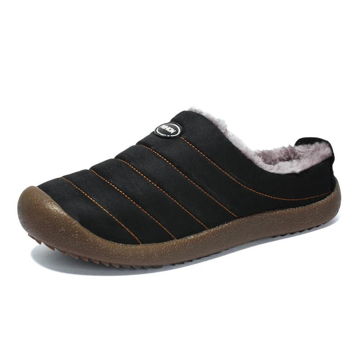 Gevoerde, antislip heren pantoffels Adam voor comfortabele avonden, vooraanzicht.