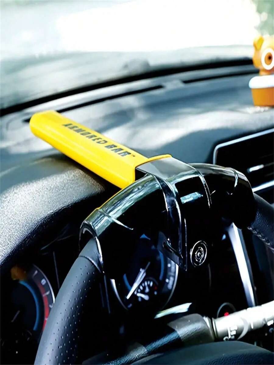 Geel, robuust stuurwielslot, universele pasvorm, voorkomt autodiefstal; eenvoudig in gebruik, maximale veiligheid.